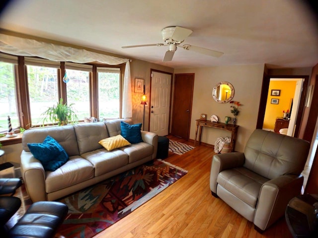 5449 Old Middleton Rd, Madison, WI 53705 - living room featuring ceiling fan, light wood-type flooring, and baseboards