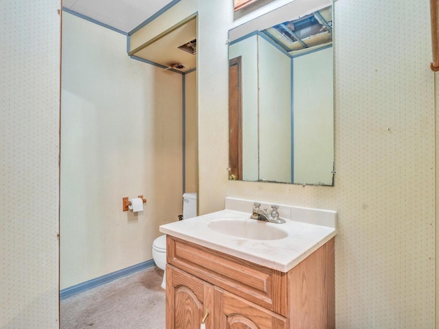 4715 Westway Ave, Racine, WI 53406 - bathroom featuring wallpapered walls, toilet, and vanity