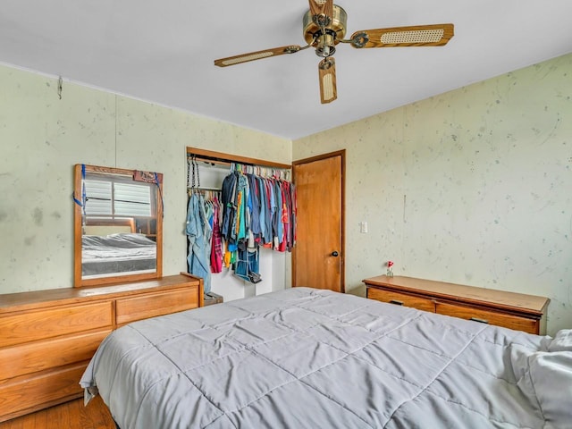 4715 Westway Ave, Racine, WI 53406 - bedroom featuring a closet, wood finished floors, a ceiling fan, and wallpapered walls