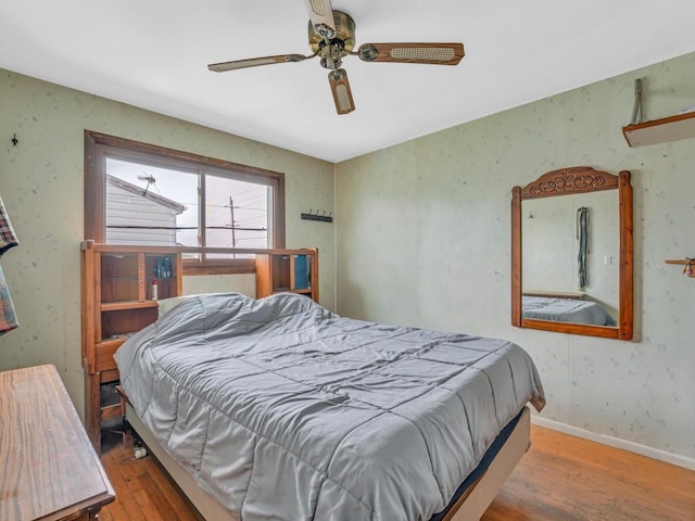 4715 Westway Ave, Racine, WI 53406 - bedroom featuring wood finished floors, a ceiling fan, and baseboards