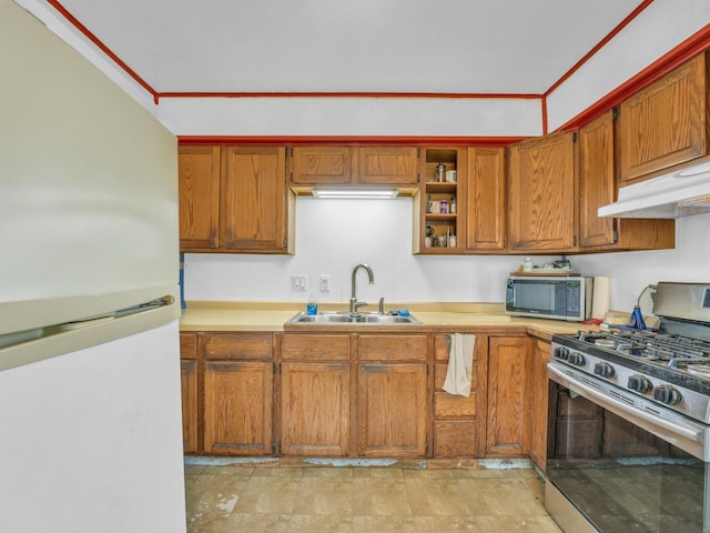 4715 Westway Ave, Racine, WI 53406 - kitchen featuring appliances with stainless steel finishes, a sink, under cabinet range hood, light countertops, and brown cabinetry