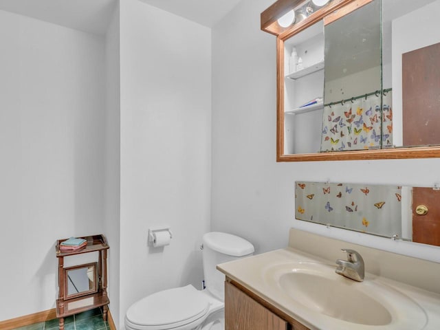 4715 Westway Ave, Racine, WI 53406 - bathroom featuring toilet, vanity, and baseboards