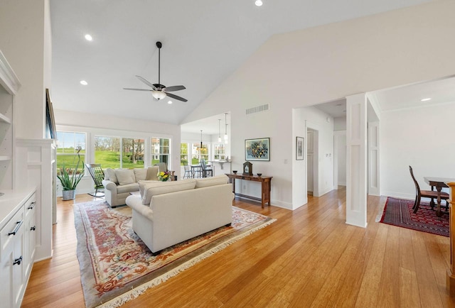 1387 Wilmington Way Unit 3-34, Lake Geneva, WI 53147 - living area with a ceiling fan, high vaulted ceiling, light wood-style floors, recessed lighting, and a chandelier