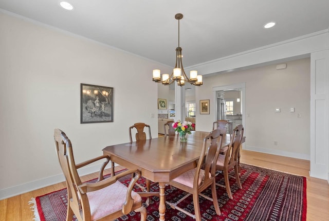 1387 Wilmington Way Unit 3-34, Lake Geneva, WI 53147 - dining room featuring a chandelier, recessed lighting, light wood-type flooring, baseboards, and crown molding