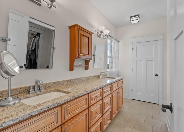 1387 Wilmington Way Unit 3-34, Lake Geneva, WI 53147 - full bathroom with tile patterned flooring, double vanity, and baseboards