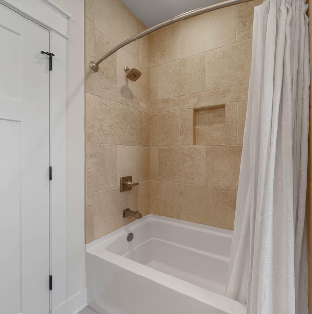 1387 Wilmington Way Unit 3-34, Lake Geneva, WI 53147 - bathroom featuring shower / bathtub combination with curtain