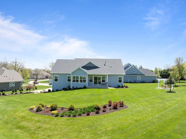 1387 Wilmington Way Unit 3-34, Lake Geneva, WI 53147 - rear view of house featuring a yard
