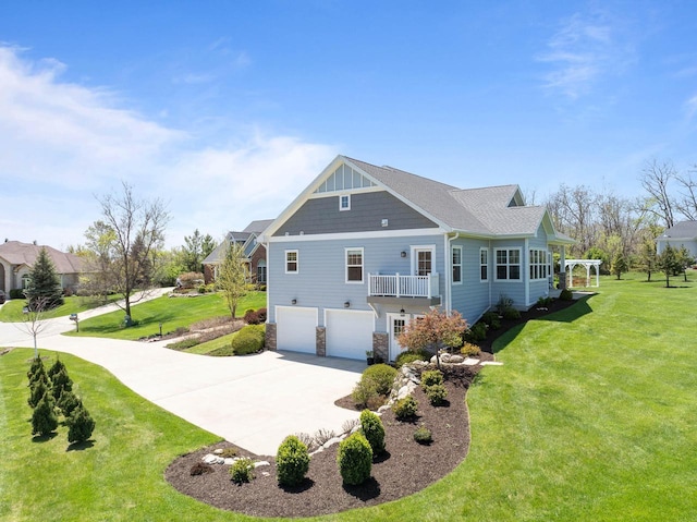 1387 Wilmington Way Unit 3-34, Lake Geneva, WI 53147 - rear view of property featuring a garage, driveway, a yard, and stone siding