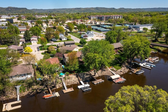drone / aerial view of a water and mountain view