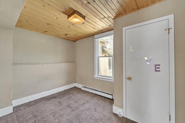 2936 S 9th Pl, Milwaukee, WI 53215 - carpeted empty room with wood ceiling, a baseboard heating unit, and baseboards