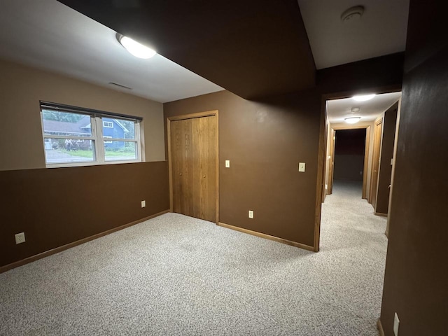 1900 Arthur St, Merrill, WI 54452 - below grade area with carpet and baseboards