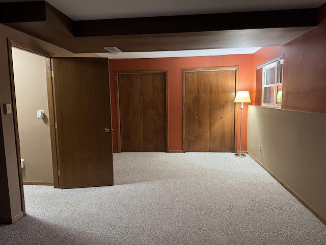 1900 Arthur St, Merrill, WI 54452 - unfurnished bedroom with carpet and two closets