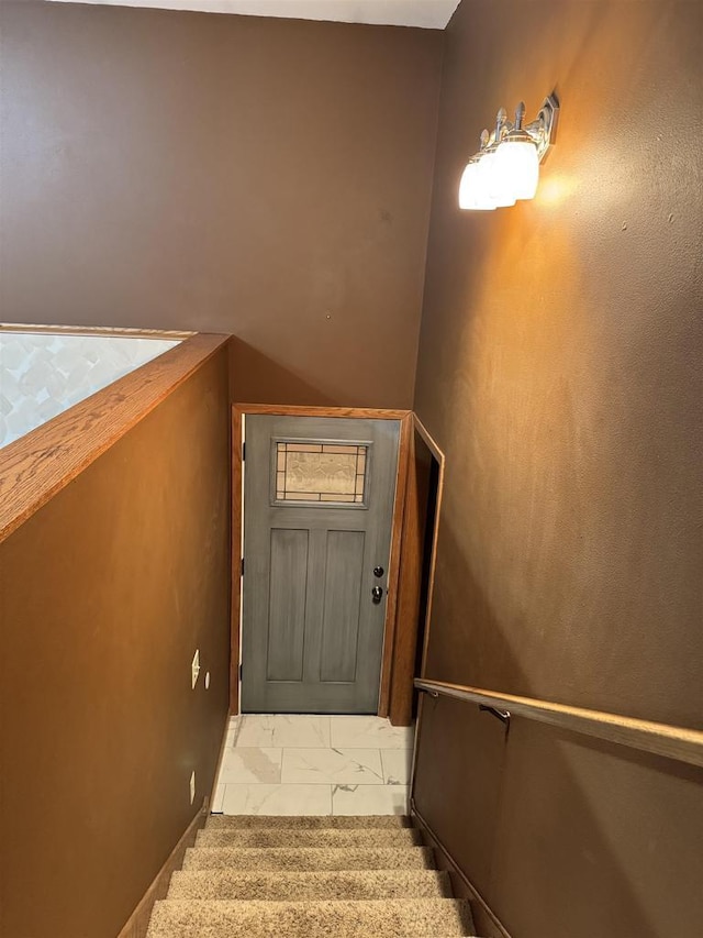 1900 Arthur St, Merrill, WI 54452 - stairway featuring marble look tile flooring