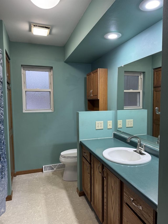 1900 Arthur St, Merrill, WI 54452 - bathroom featuring toilet and vanity