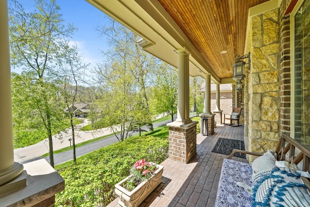 1521 Geneva Club Dr Unit 18-05, Lake Geneva, WI 53147 - view of patio / terrace with a porch