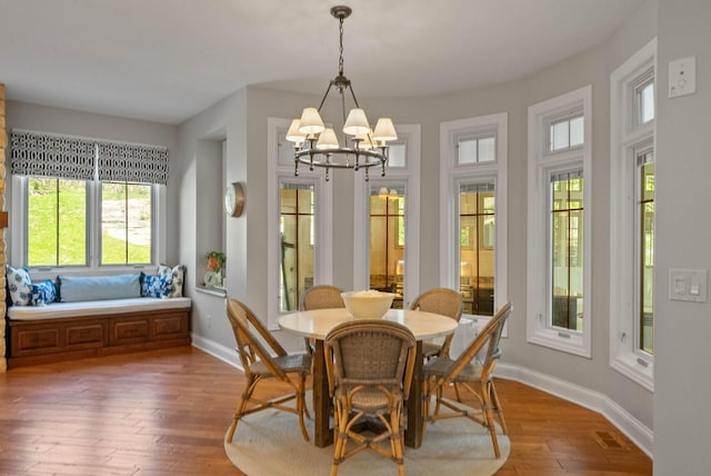 1521 Geneva Club Dr Unit 18-05, Lake Geneva, WI 53147 - sunroom with a chandelier