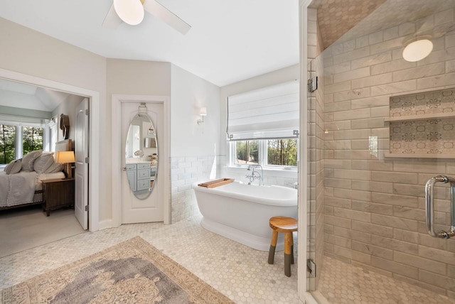 1521 Geneva Club Dr Unit 18-05, Lake Geneva, WI 53147 - bathroom with a stall shower, healthy amount of natural light, a freestanding tub, and tile walls