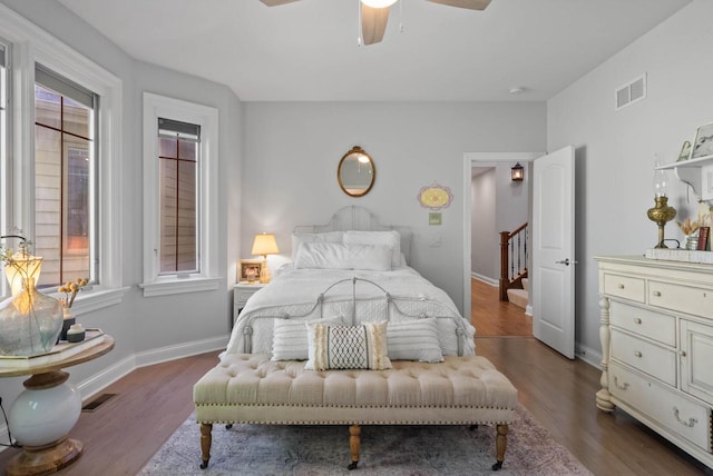 1521 Geneva Club Dr Unit 18-05, Lake Geneva, WI 53147 - bedroom with wood finished floors, baseboards, and a ceiling fan
