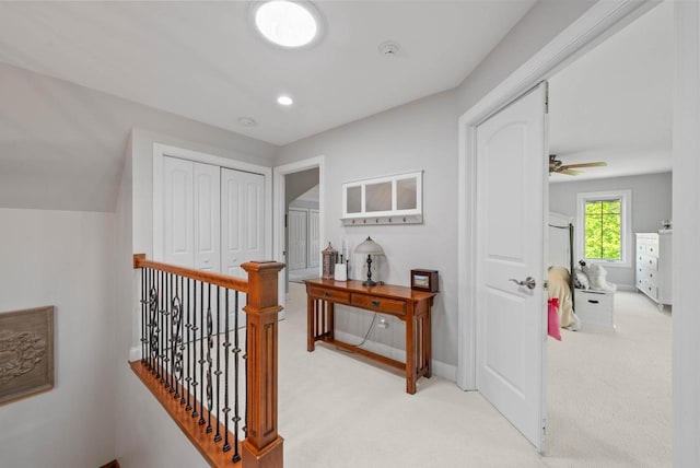 1521 Geneva Club Dr Unit 18-05, Lake Geneva, WI 53147 - corridor featuring light colored carpet, an upstairs landing, baseboards, and recessed lighting