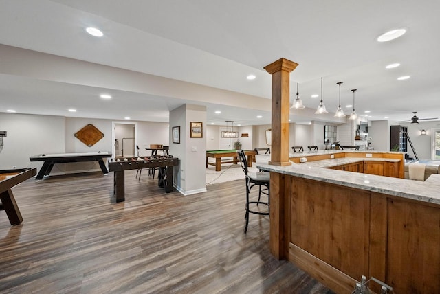 1521 Geneva Club Dr Unit 18-05, Lake Geneva, WI 53147 - kitchen with billiards table, recessed lighting, dark wood-type flooring, light stone countertops, and baseboards