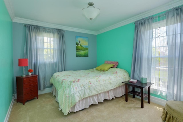 bedroom featuring light carpet, ornamental molding, and baseboards