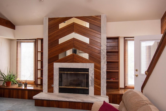 848 Kendall Ln Unit 5H, Lake Geneva, WI 53147 - carpeted living room with a glass covered fireplace