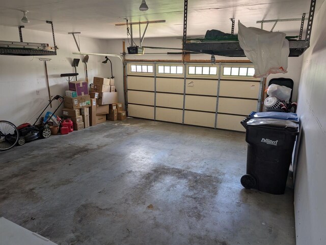 4374 Bent Grass Ct, Windsor, WI 53598 - garage featuring a garage door opener