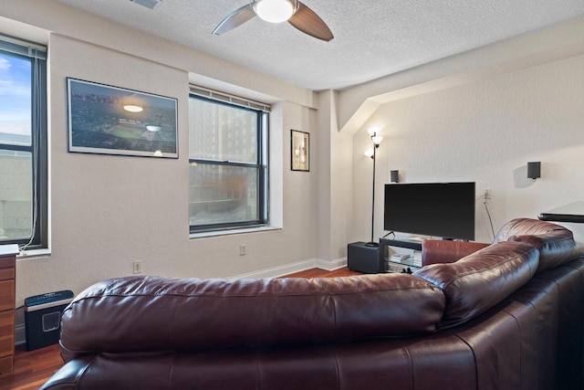606 W Wisconsin Ave Unit 405, Milwaukee, WI 53203 - living area with wood finished floors, a ceiling fan, and a textured ceiling