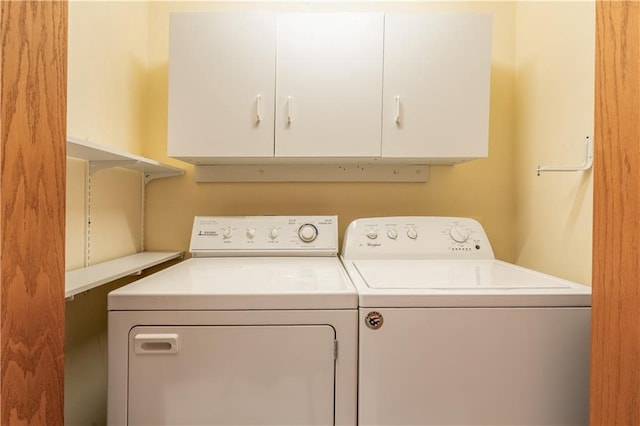 1153 Weather Ridge Rd, Chippewa Falls, WI 54729 - laundry room with washer and dryer and cabinet space
