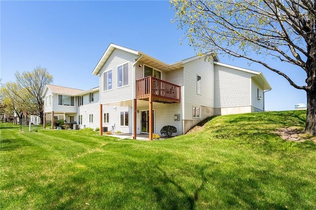 1153 Weather Ridge Rd, Chippewa Falls, WI 54729 - back of house with a yard and central AC unit