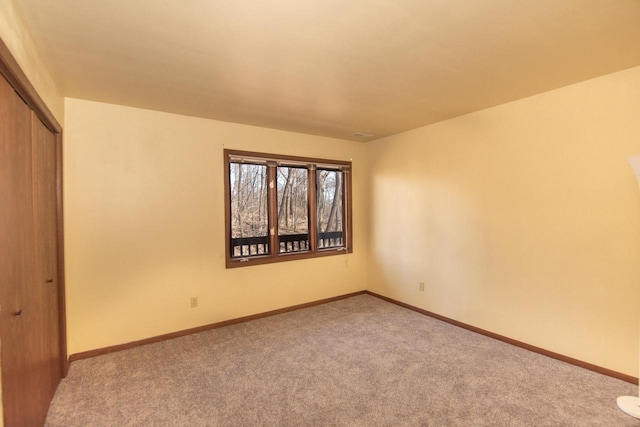 1031 N Osborne Blvd, Racine, WI 53405 - unfurnished room featuring carpet flooring and baseboards