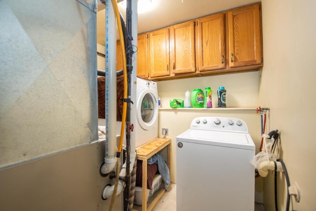 1031 N Osborne Blvd, Racine, WI 53405 - washroom with washer / dryer and cabinet space