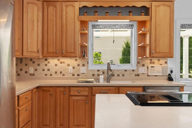 8705 Nelson Xing, Verona, WI 53593 - kitchen with open shelves, a sink, tasteful backsplash, and light countertops