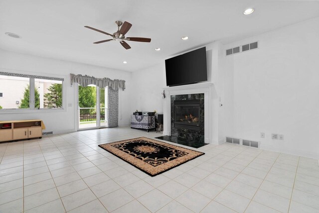 8705 Nelson Xing, Verona, WI 53593 - tiled living area featuring a ceiling fan, a fireplace, and recessed lighting