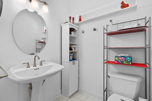 8705 Nelson Xing, Verona, WI 53593 - bathroom with tile patterned flooring, toilet, baseboards, and a sink