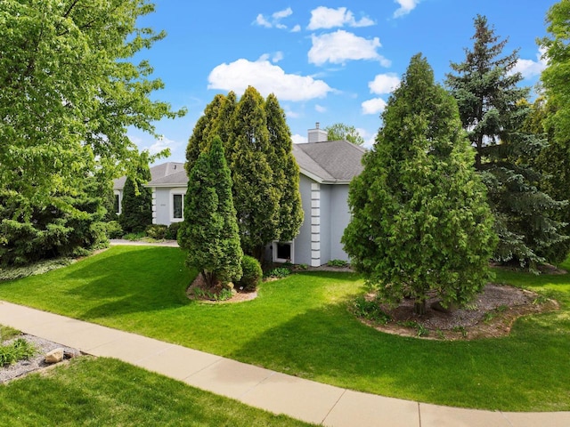 8705 Nelson Xing, Verona, WI 53593 - view of front of property with a front yard and stucco siding