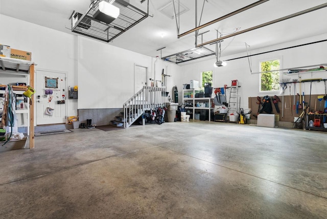 8705 Nelson Xing, Verona, WI 53593 - garage featuring a garage door opener