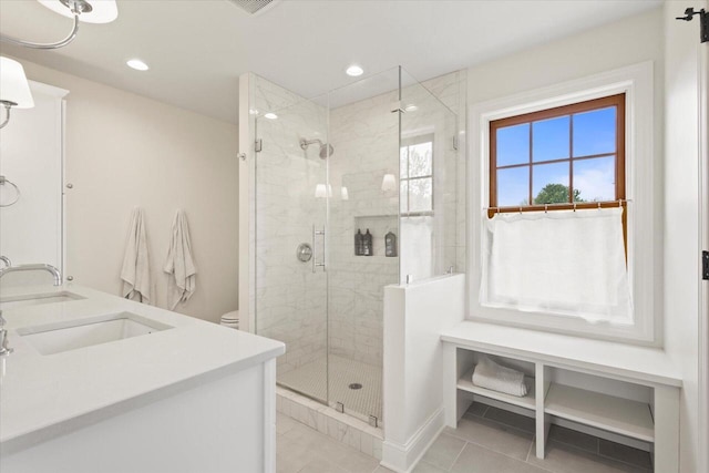 N39W32890 High Hill Ct, Nashotah, WI 53058 - bathroom featuring a shower stall, tile patterned flooring, recessed lighting, double vanity, and toilet