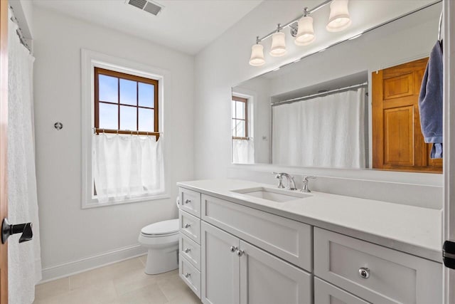 N39W32890 High Hill Ct, Nashotah, WI 53058 - full bath with baseboards, toilet, vanity, and tile patterned flooring
