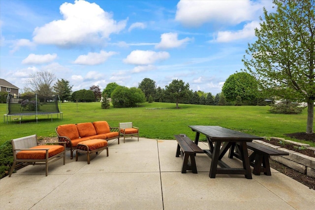 N39W32890 High Hill Ct, Nashotah, WI 53058 - view of patio featuring a trampoline, outdoor dining space, and an outdoor living space