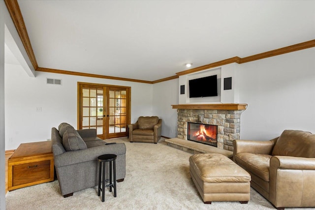 N39W32890 High Hill Ct, Nashotah, WI 53058 - living area with ornamental molding, light carpet, a fireplace, and french doors