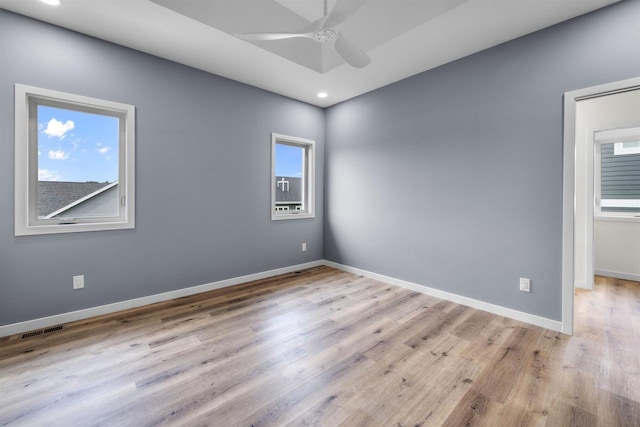1407 Ridgetrail Dr, Cross Plains, WI 53528 - empty room with ceiling fan, wood finished floors, baseboards, and recessed lighting