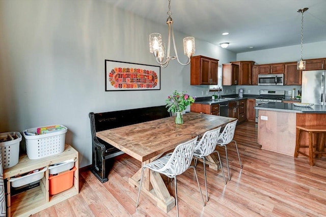 6972 Heirloom Dr, Deforest, WI 53532 - dining room with a chandelier, light wood-style flooring, and recessed lighting