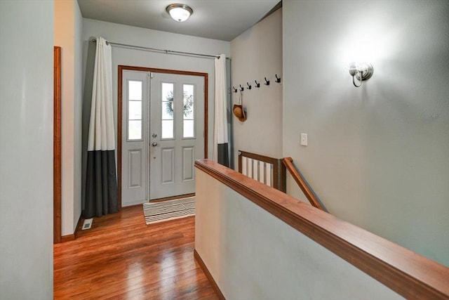 6972 Heirloom Dr, Deforest, WI 53532 - entryway featuring wood finished floors and baseboards