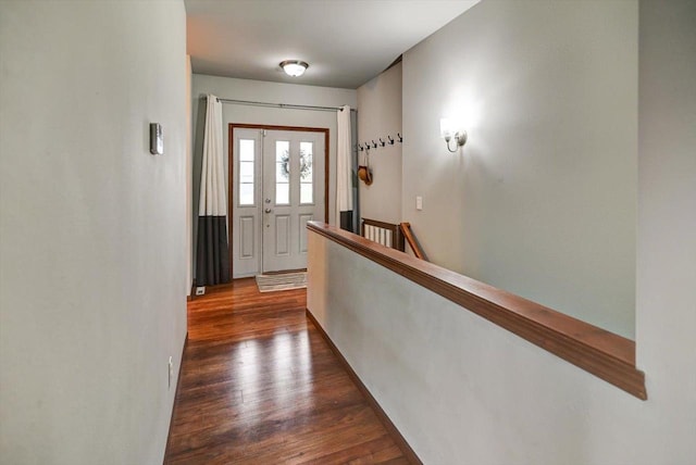 6972 Heirloom Dr, Deforest, WI 53532 - entryway featuring dark wood finished floors and baseboards