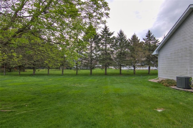 3329 E Meadows Pl, Eau Claire, WI 54701 - view of grassy yard with central air condition unit