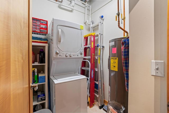 1325 N Van Buren St Unit 308, Milwaukee, WI 53202 - laundry area with stacked washer and clothes dryer and electric water heater