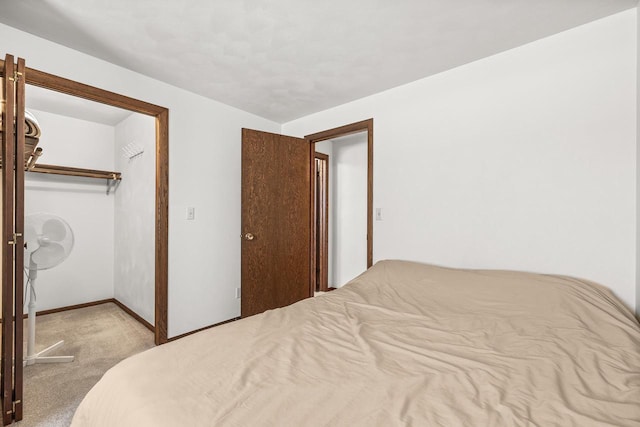 7256 State Highway 66, Custer, WI 54423 - bedroom featuring carpet, a closet, and baseboards