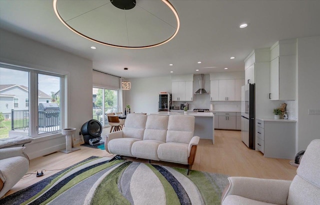 6612 Vista Vly, Windsor, WI 53598 - living room with light wood-type flooring and recessed lighting
