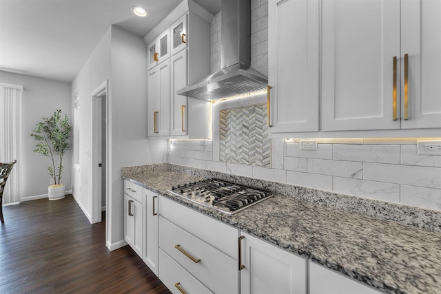 432 Tawny Elm Pkwy, Verona, WI 53593 - kitchen featuring wall chimney exhaust hood, stainless steel gas stovetop, baseboards, light stone counters, and recessed lighting